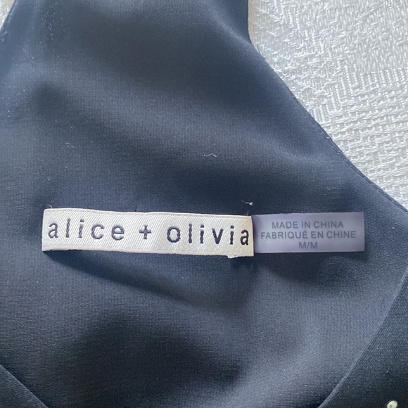 Alice + Olivia mini dress. Black racer back with silver rivets/studs. Size M - Picture 4 of 7